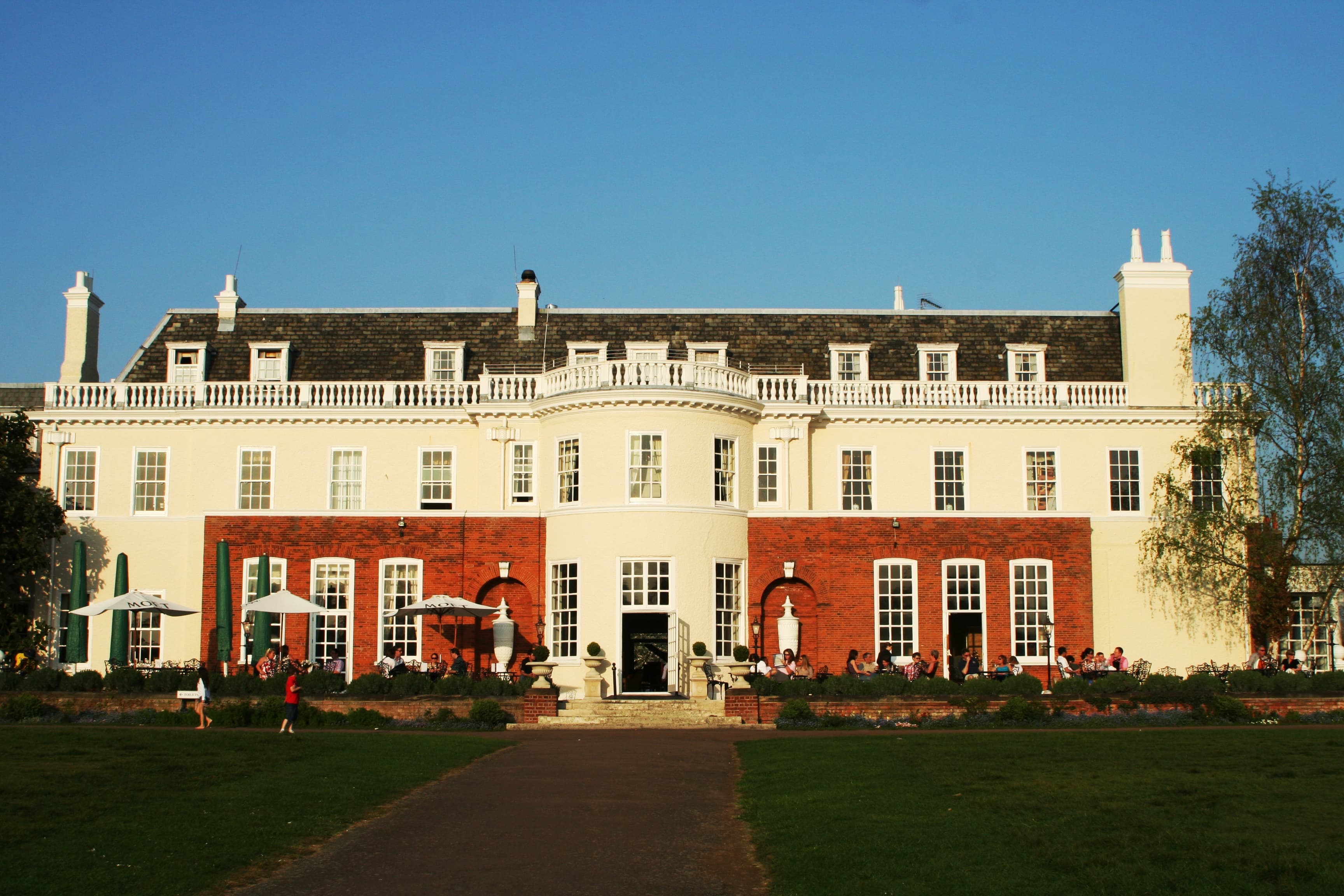 The facade of Cannizaro House, a Georgian manor hotel set in 34 acres of Cannizaro Park adjacent to Wimbledon Common