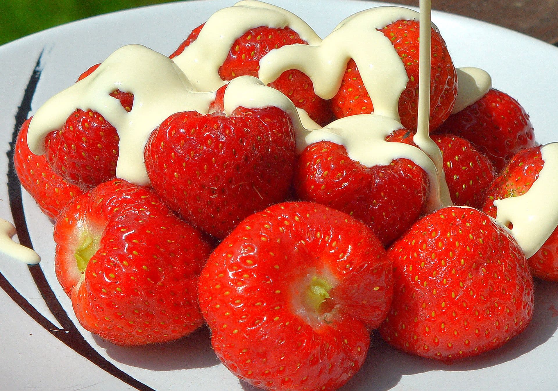 Wimbledon strawberries and cream served in the traditional pot at the All England Club, 2014